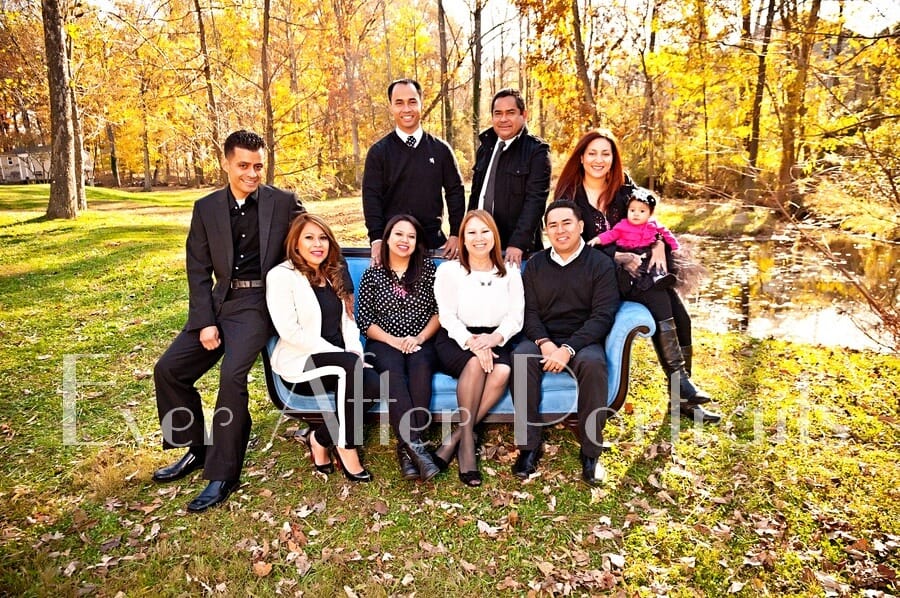 Family of three generations in outdoor portrait.