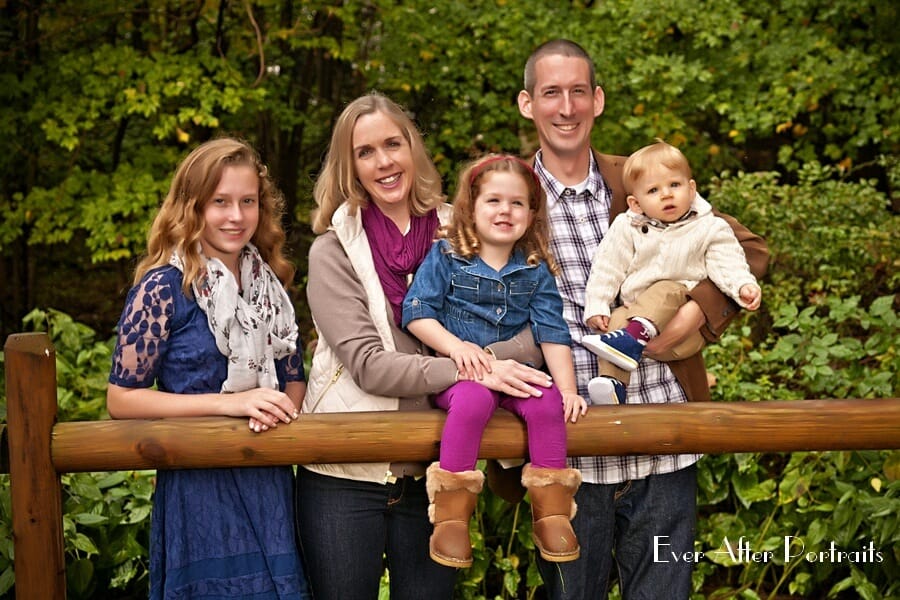 Family of five in outdoor image.